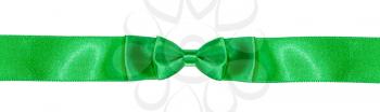 symmetric double bow knot on narrow green satin ribbon isolated on white background
