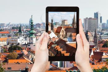 travel concept - tourist snapshot of old town Bratislava city on tablet pc