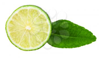 slice of fresh green kaffir lime fruit with leaf isolated on white background