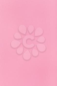 vertical background from pink colored sheet of paper