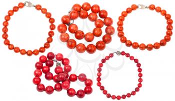 set of necklaces from red coral beads isolated on white background