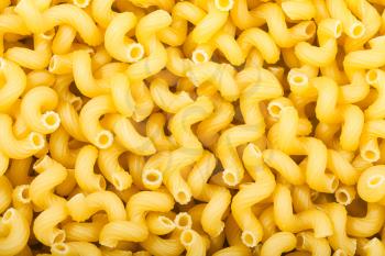 food background - durum wheat semolina pasta spaghetti