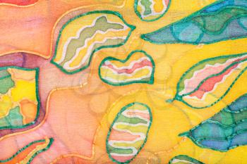 textile background - yellow and green abstract hand painted picture on silk batik