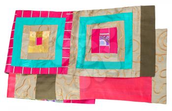 handmade patchwork silk scarf with square pattern isolated on white background