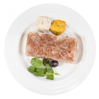 top view of portion of meat aspic on white plate isolated on white background