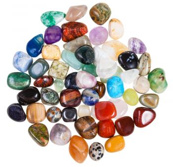 top view of pile various gemstones on white background