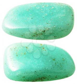 natural mineral gem stone - two aquamarine (beryl) gemstones isolated on white background close up