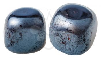 natural mineral gem stone - two Hematite (haematite) gemstones isolated on white background close up