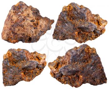 macro shooting of specimen natural rock - four pieces of hematite (haematite, iron ore) mineral stone isolated on white background