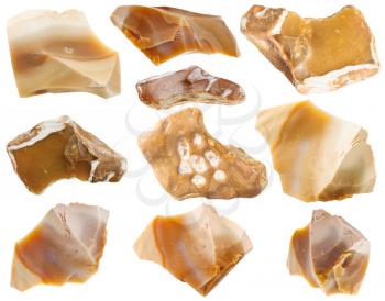 macro shooting of collection natural rock - set of flint mineral stones isolated on white background