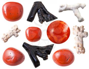 set of natural ornamental stones - coral gemstones and pieces isolated on white background