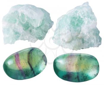 set of natural mineral gemstones - green Fluorite (fluorspar) tumbled gem stones and rocks isolated on white background close up