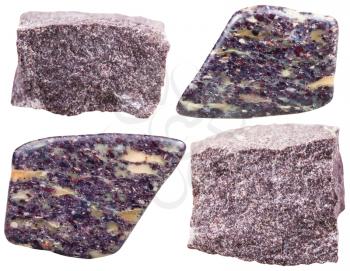 macro shooting of natural mineral stone - set of Alunite tumbled gemstone and rocks isolated on white background