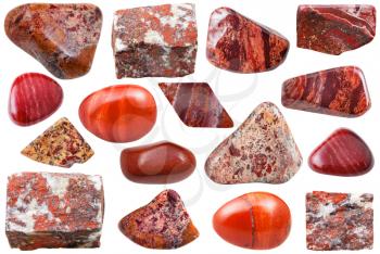 set of natural mineral stones - specimens of red jasper tumbled gemstones and rocks isolated on white background