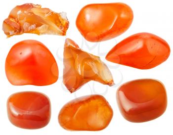 set of natural mineral stones - specimens of carnelian (cornelian, sard) tumbled gemstones and rocks isolated on white background
