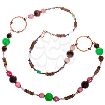 necklace from natural gemstones (green aventurine, tigereye, rhodonite, agate, jasper), carved coconut, glass beads, copper rings isolated on white background