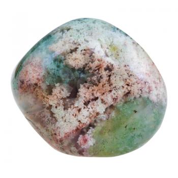 macro shooting of natural gemstone - tumbled moss agate (mocha stone) mineral gem stone isolated on white background