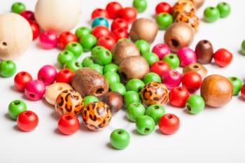 many various painted wooden beads close up