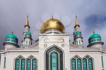 Moscow Cathedral Mosque - main mosque of Moscow, Russia under gray clouds in sunny spring day