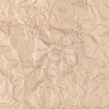 square background from crumpled kraft paper close up