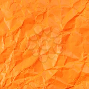 square background from orange colour crumpled paper