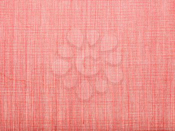 textile background - red transparent silk batiste fabric with weave pattern of threads close up