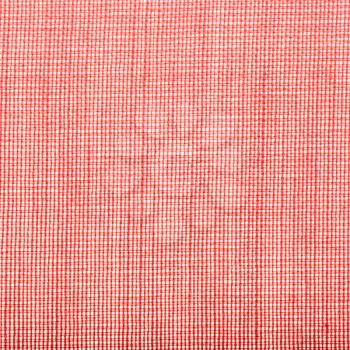 square textile background - red transparent silk batiste fabric with weave pattern of threads close up