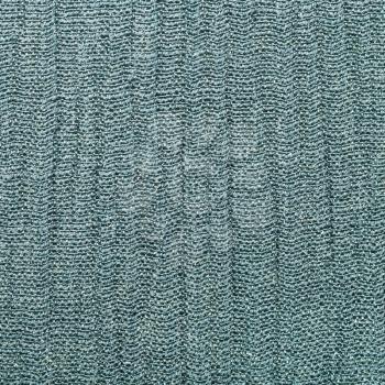 square textile background - gray green silk fabric with Crepon weave pattern of threads close up