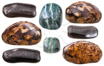 set of various Enstatite (bronzite, green and brown hypersthene) natural mineral stones and gemstones isolated on white background