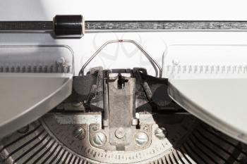ink ribbon in old typewriter close up