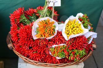 travel to Italy - basket with hot pepper on vegetable market in Italy