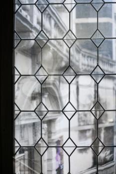 travel to Italy - medieval window glass in old house in Venice