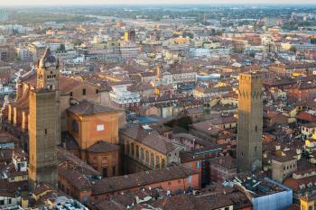 travel to Italy - above view of basilica san petronio and towers in Bologna city from Torre Asinelli ( Asinelli Tower) at sunset