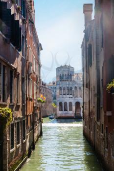 travel to Italy - narrow canal between old palaces in Venice city