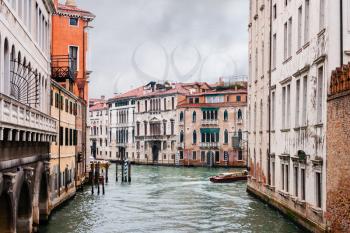 travel to Italy - canal and old buildings in Venice city in rainy autumn day