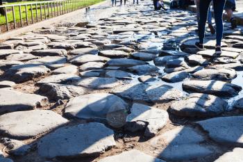 travel to Italy - cobble stone in the end of ancient Appian Way (via Appia) on Roman forum in Rome city