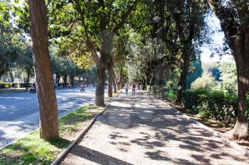 travel to Italy - people in public urban park of Villa Borghese gardens in Rome city in autumn