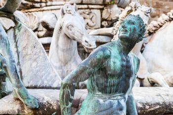 travel to Italy - sculpture of fountain of neptune close up in Florence city