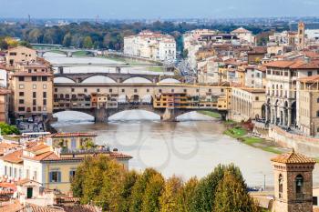 travel to Italy - above view of Ponte Vecchio in Florence city from Piazzale Michelangelo