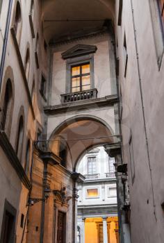 travel to Italy - house in arch in historic district of Florence city