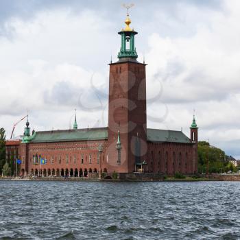 view of City Hall in Stockholm from water in autumn day