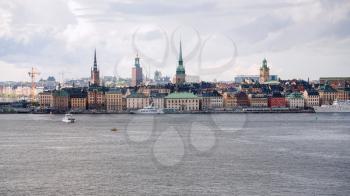 view of Stockholm city (Galma Stan, Old Town) from sea in autumn day
