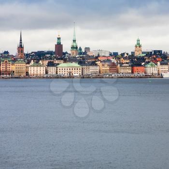 view of Stockholm city (Galma Stan) from sea in cloudy autumn day