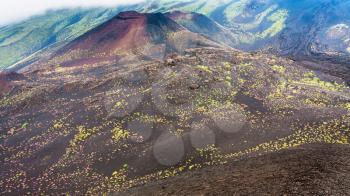 travel to Italy - hardened lava fields and craters on Mount Etna in Sicily in summer day