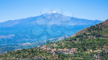 travel to Italy - view of villages and Etna volcano in Sicily