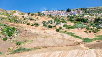travel to Italy - agrarian fields and cemetry in southern Sicily in summer day