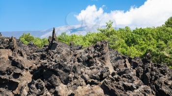 travel to Italy - sharp lava stones after volcano Etna eruption in Sicily , close up