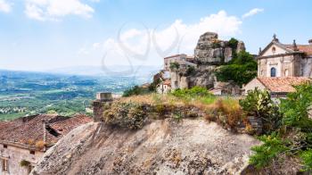 travel to Italy - view of Lauria Castle (Castello di Lauria, Castle of Roger of Lauria) and Basilica della Madonna della Catena in Castiglione di Sicilia town in Sicily