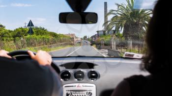 travel to Italy - driving a car in rural region in Sicily in summer day