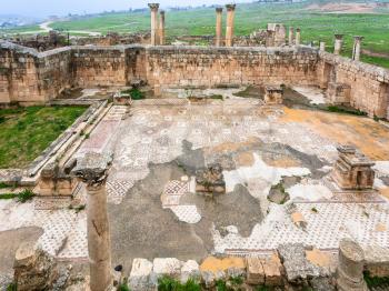 Travel to Middle East country Kingdom of Jordan - ruin of ancient christian church in Jerash (roman Gerasa) town in winter